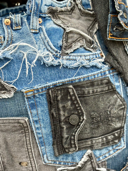 Close up denim bag with star and black pocket