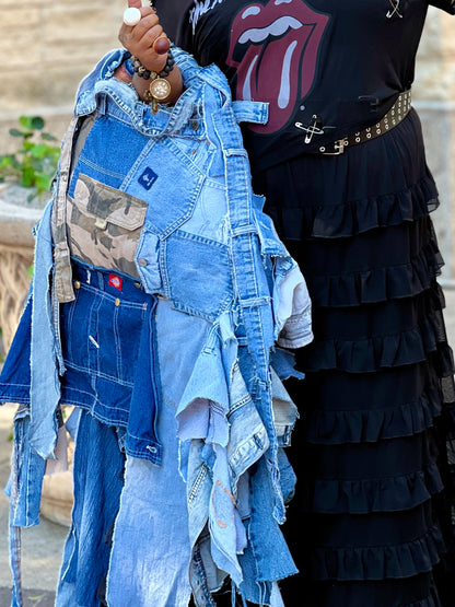 Woman showing off another ugly denim bag: Funky Grunge Boutique