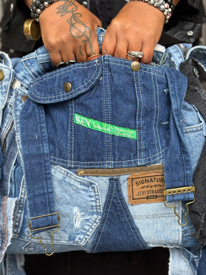 Woman holding denim bag 